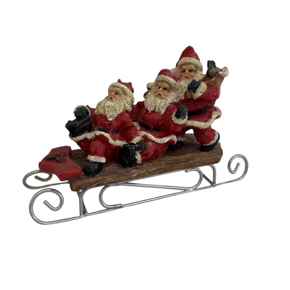 Three Jolly Santas Riding On a Sled‎ Christmas Figurine Vintage 90s